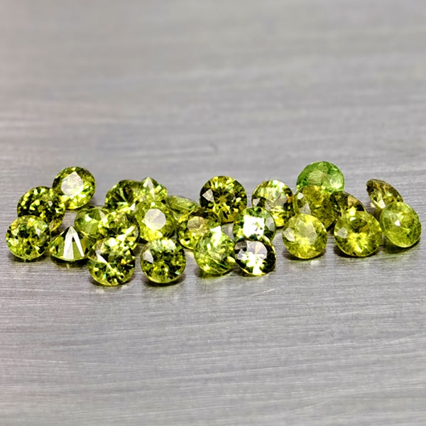 Natural Yellowish Green Demantoid Garnet 1.22 Ct. 25 Pcs Round Diamond Cut Gemstones From Madagascar: Product ID: 802936580 Product Name: Natural Demantoid Weight: 1.22 CT. Size: 2.4 x 2.4 x 1.4 to 1.7 x 1.7 x 1 MM. Shape: Round Diamond Cut Color: Yellowish Green Clarity:VSI Luster: Good Gems Origin: 