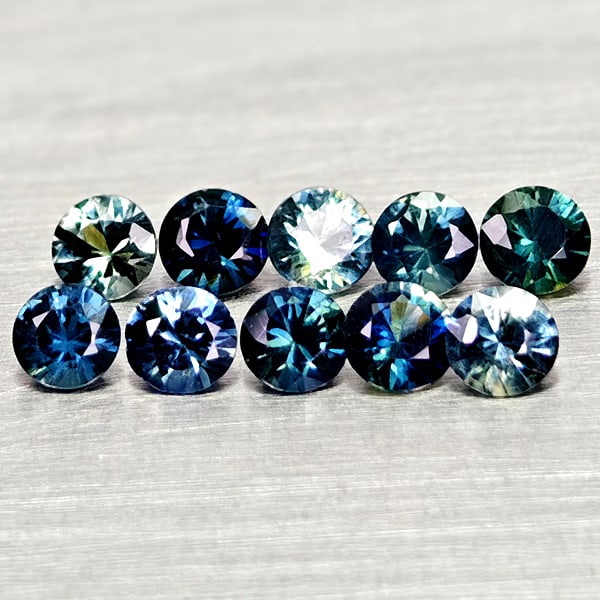 Natural Fancy Color Sapphire 1.05 Ct. 10 Pcs Round Diamand Cut 3 Mm Gemstones From Tanzania: Product ID: 806162274 Product Name: Natural Green Sapphire Weight: 1.05 CT. Size: 3 x 3 x 1.9 MM. Shape: Round Diamond Cut Color: Fancy Color Clarity:VSI Luster: Very Good Gems Origin: Tanzania Treatm