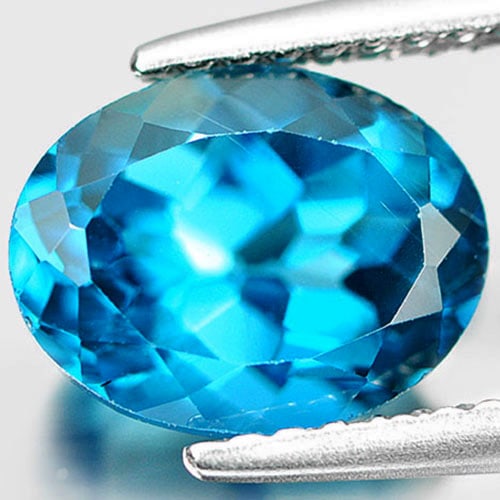 Natural London Blue Topaz 2.50 Ct. Oval Shape 9 x 7 Mm. Gemstone From Brazil: Product ID: 807161044 Product Name: Natural Blue Topaz Weight: 2.50 CT. Size: 9 x 7 x 5.2 MM. Shape: Oval Color: London Blue Clarity:VS Luster: Good Gems Origin: Brazil Treatment: Treated Crystal Stru