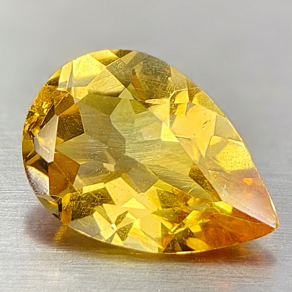 Natural Yellow Citrine 2.24 Ct. Pear Shape 11.8 x 8.2 Mm Gemstnone From Brazil: Product ID: 801815018 Product Name: Natural Citrine Weight: 2.24 CT. Size: 11.8 x 8.2 x 4.9 MM. Shape: Pear Color: Yellow Clarity:VSI Luster: Good Gems Origin: Brazil Treatment: Unheated Crystal Struc