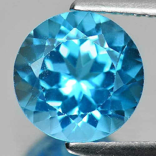 Natural Swiss Blue Topaz 3.51 Ct. Round Shape 9.1 Mm Gemstone From Brazil: Product ID: 807157068 Product Name: Natural Blue Topaz Weight: 3.51 CT. Size: 9.1 x 9.1 x 6 MM. Shape: Round Color: Blue Clarity:SI1 Luster: Good Gems Origin: Brazil Treatment: Treated Crystal Structu
