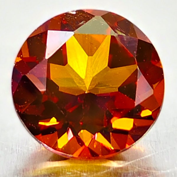 Natural Cracking Fire Color Topaz 1.64 Ct. Clean Round Shape 7.1 Mm Gemstone From Brazil: Product ID: 807167859 Product Name: Natural Topaz Weight: 1.64 CT. Size: 7.1 x 7.1 x 4.6 MM. Shape: Round Color: Cracking Fire Clarity:IF Luster: Very Good Gems Origin: Brazil Treatment: Treated Cryst
