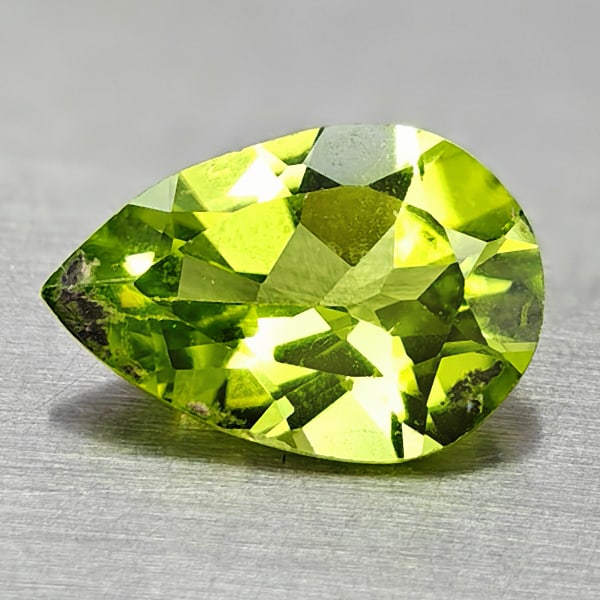 Natural Green Peridot 1.66 Ct. Pear Shape 9.8 x 6.7 Mm. Gemstone From Pakistan: Product ID: 805317013 Product Name: Natural Weight: 1.66 CT. Size: 9.8 x 6.7 x 4 MM. Shape: Pear Color: Green Clarity:VSI Luster: Good Gems Origin: Pakistan Treatment: Unheated Crystal Structure: Hard