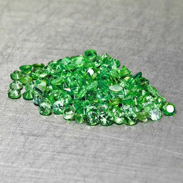 Natural Green Tsavorite Garnet 2.72 Ct. 135 Pcs Round Diamond Cut 1.6 Mm Gemstones From Tanzania: Product ID: 802936501 Product Name: Natural Tsavorite Weight: 2.72 CT. Size: 1.6 x 1.6 x 1.4 MM. Shape: Round Diamond Cut Color: Green Clarity:VSI Luster: Very Good Gems Origin: Tanzania Treatment: Un