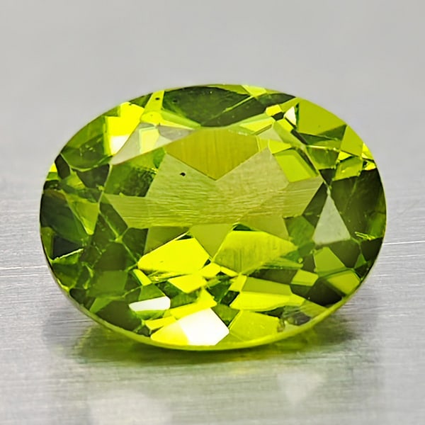 Natural Green Peridot 2.23 Ct. Oval Shape 7 x 9 Mm. Gemstone From Pakistan: Product ID: 805316930 Product Name: Natural Peridot Weight: 2.23 CT. Size: 7 x 9 x 4.6 MM. Shape: Oval Color: Green Clarity:VSI Luster: Good Gems Origin: Pakistan Treatment: Unheated Crystal Structure
