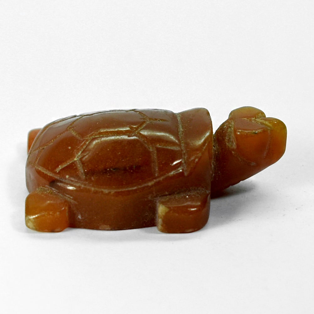 Natural Honey Jade 169.29 Ct. Turtle Carving Size 32 x 50 x 15 Mm.: Product ID: 818102437 Product Name: Natural Gemstones Weight: 169.29 CT. Size: 32 x 50 x 15 MM. Shape: Caving Color: multi Color brown Honey Clarity:Opaque Luster: Good Gems Origin: Burma Treatment: U
