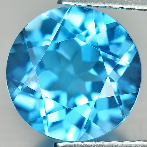 Natural Swiss Blue Topaz 3.67 Ct. VVS Round Shape Size 9.2 Mm. Gemstone From Brazil: Product ID: 807156267 Product Name: Natural Blue Topaz Weight: 3.67 CT. Size: 9.2 x 9.2 x 5.9 MM. Shape: Round Color: Swiss Blue Clarity:VVS Luster: Good Gems Origin: Brazil Treatment: Treated Crystal