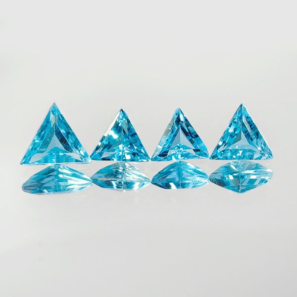 Natural Swiss Blue Topaz 2.20 Ct. 4 Pcs Trilliant Shape 6.2 x 6.2 Mm. Gemstones From Brazil: Product ID: 807167767 Product Name: Natural Blue Topaz Weight: 2.20 CT. Size: 6.2 x 6.2 x 3.1 MM. Shape: Trilliant Color: Blue Clarity:VVS Luster: Good Gems Origin: Brazil Treatment: Treated Crystal S