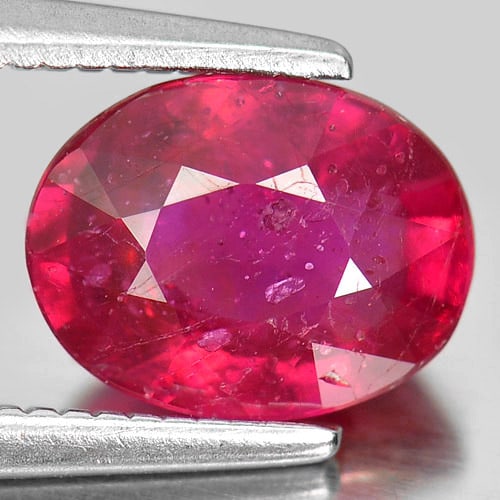 Natural Purplish Pink Ruby 1.98 Ct. Oval Shape 8 x 6.1 Mm. Gemstone From Mozambique: Product ID: 805926759 Product Name: Natural Ruby Weight: 1.98 CT. Size: 8 x 6.1 x 4.2 MM. Shape: Oval Color: Purplish Pink Clarity:VSI Luster: Good Gems Origin: Mozambique Treatment: Heated (Lead-glas