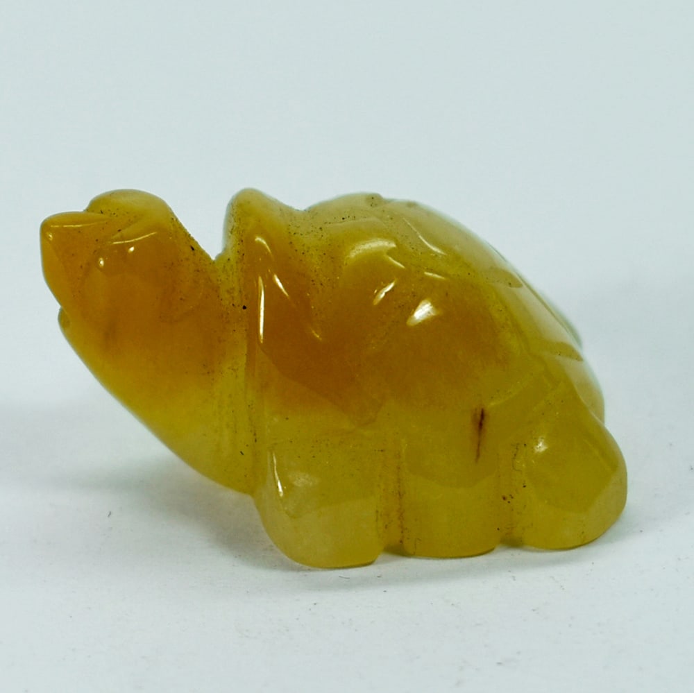 Natural Honey Jade 116.25 Ct. Turtle Carving Size 28 x 38 x 20 Mm. From Burma: Product ID: 818102409 Product Name: Natural Gemstones Weight: 116.25 CT. Size: 28 x 38 x 20 MM. Shape: Caving Color: multi Color brown Honey Clarity:Opaque Luster: Good Gems Origin: Burma Treatment: U