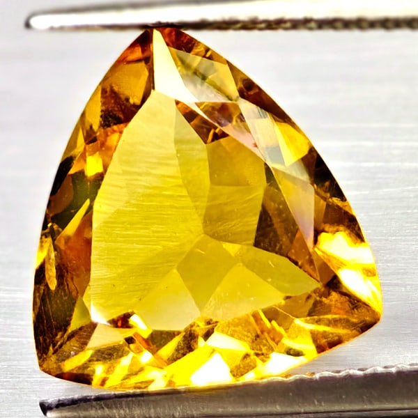 Natural Yellow Citrine 4.18 Ct. Trilliant Shape 12.2 x 11.8 Mm Gemstone From Brazil: Product ID: 801815118 Product Name: Natural Weight: 4.18 CT. Size: 12.2 x 11.8 x 5.8 MM. Shape: Trilliant Color: Yellow Clarity:VSI Luster: Good Gems Origin: Brazil Treatment: Unheated Crystal Structu