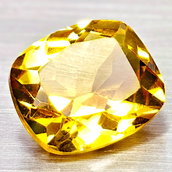Natural Yellow Citrine 3.98 Ct. Cushion Shape 11.2 x 9.4 Mm Gemstone From Brazil: Product ID: 801815120 Product Name: Natural Citrine Weight: 3.98 CT. Size: 11.2 x 9.4 x 6.7 MM. Shape: Cushion Shape Color: Yellow Clarity:VSI Luster: Good Gems Origin: Brazil Treatment: Unheated Crys