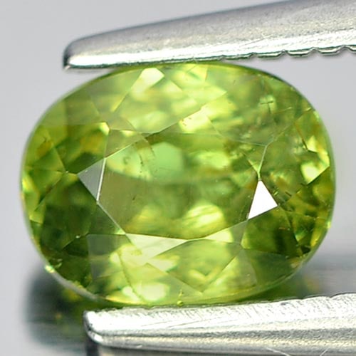 Natural Green Demantoid Garnet 1.00 Ct. Oval Shape 6.3 x 4.9 Mm. Gemstone From Madagascar: Product ID: 802922473 Product Name: Natural Demantoid Weight: 1.00 CT. Size: 6.3 x 4.9 x 3.6 MM. Shape: Oval Color: Green Clarity:SI Luster: Good Gems Origin: Mardagascar Treatment: Unheated Crystal S