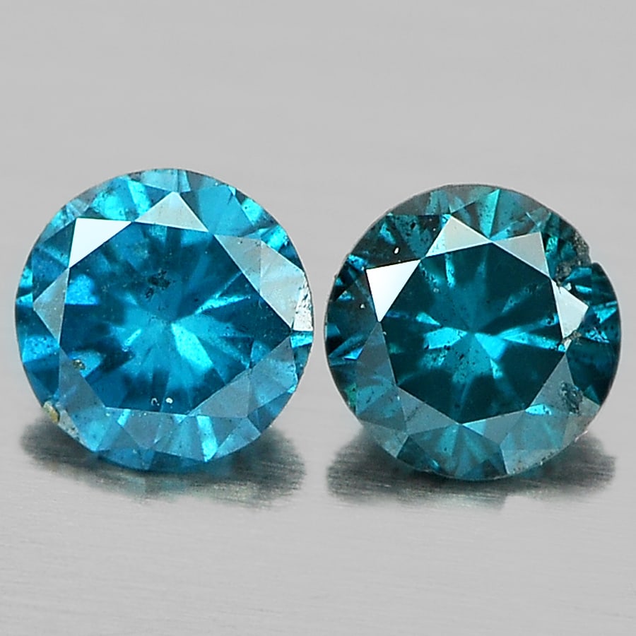 Natural Blue Loose Diamond 0.18 Ct. 2 Pcs Round Brilliant Cut 2.8 Mm Gemstone From Belgium: Product ID: 802103058 Product Name: Natural Enhanced Diamond Weight: 0.18 CT. Size: 2.8 x 2.8 x 1.6 MM. Shape: Round Brilliant Cut Color: Blue Clarity:VSI Luster: Scintillating Gems Origin: Belgium Tr