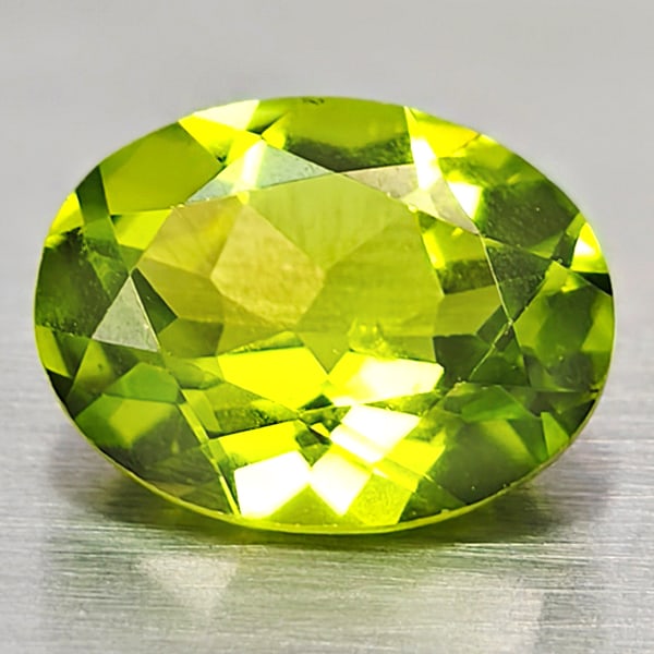 Natural Green Peridot 2.04 Ct. Oval Shape 7.2 x 9 Mm. Gemstone From Pakistan: Product ID: 805316934 Product Name: Natural Peridot Weight: 2.04 CT. Size: 7.2 x 9 x 4.4 MM. Shape: Oval Color: Green Clarity:VSI Luster: Good Gems Origin: Pakistan Treatment: Unheated Crystal Structu