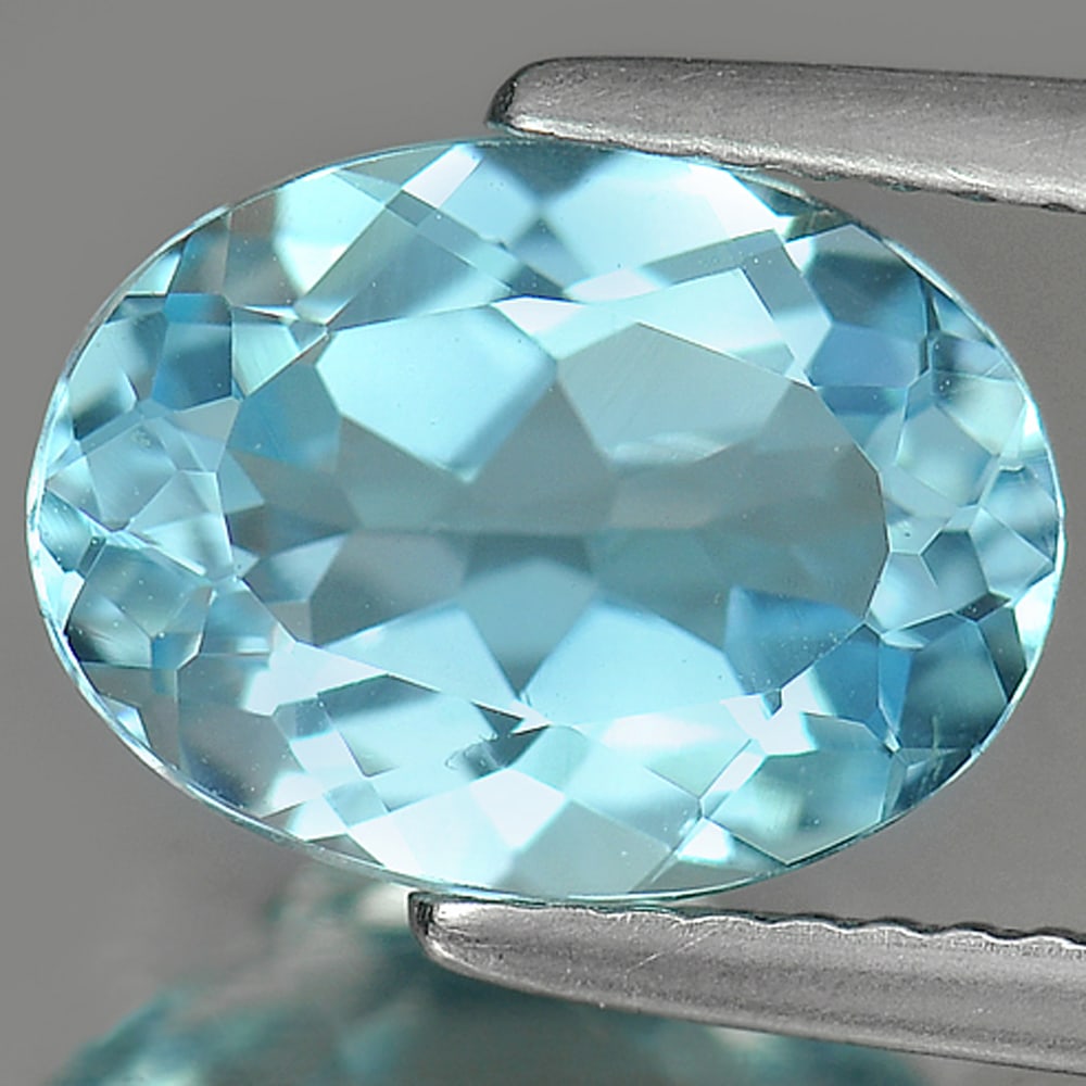 Natural Blue Topaz 3.46 Ct. VVS Oval Shape 11 x 8.2 Mm. Gemstone From Brazil: Product ID: 807165452 Product Name: Natural Blue Topaz Weight: 3.46 CT. Size: 11 x 8.2 x 5 MM. Shape: Oval Color: Blue Clarity:VVS Luster: Good Gems Origin: Brazil Treatment: Treated Crystal Structure