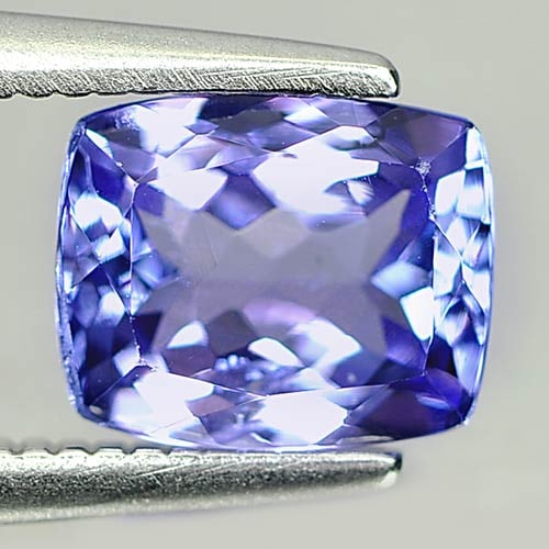 Natural Violetish Blue Tanzanite 1.31 Ct. Cushion Shape 7.2 x 5.9 Mm. Gemstone: Product ID: 807010750 Product Name: Natural Tanzanite Weight: 1.31 CT. Size: 7.2 x 5.9 x 3.7 MM. Shape: Cushion Color: Violetish Blue Clarity:SI1 Luster: Good Gems Origin: Tanzania Treatment: Heated C