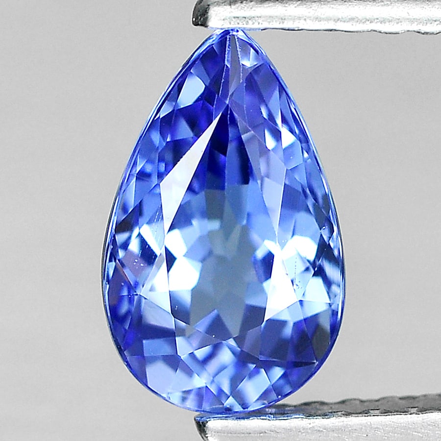 Natural Violetish Blue Tanzanite 1.40 Ct. Clean Pear Shape 8.8 x 5.4 Mm. Gemstone From Tanzania: Product ID: 807005941 Product Name: Natural Tanzanite Weight: 1.40 CT. Size: 8.8 x 5.4 x 4.4 MM. Shape: Pear Color: Violetish Blue Clarity:IF Luster: Good Gems Origin: Tanzania Treatment: Heated Cryst