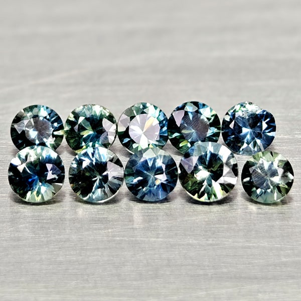 Natural Fancy Color Sapphire 1.19 Ct. 10 Pcs Round Diamand Cut 3.1 Mm Gemstones From Tanzania: Product ID: 806162269 Product Name: Natural Green Sapphire Weight: 1.19 CT. Size: 3.1 x 3.1 x 2.1 MM. Shape: Round Diamond Cut Color: Fancy Color Clarity:VSI Luster: Very Good Gems Origin: Tanzania Tr