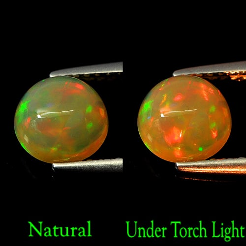 Natural Multi Color Opal 0.98 Ct. Round Cabochon 7 Mm. Unheated Gemstone: Product ID: 818727118 Product Name: Natural Opal Weight: 0.98 CT. Size: 7 x 3.9 MM. Shape: Round Cabochon Color: Multi Color Clarity:Semi - Transparent Luster: Iridescent Gems Origin: Ethiopia Treatme