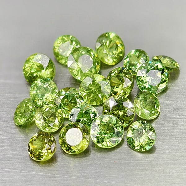 Natural Green Demantoid Garnet 3.25 Ct. 20 Pcs. Round Diamond Cut 3.5 Mm Gemstones From Madagascar: Product ID: 802936430 Product Name: Natural Demantoid Weight: 3.25 CT. Size: 3.5 x 3.5 x 2.3 MM. Shape: Round Diamond Cut Color: Green Clarity:VVS Luster: Good Gems Origin: Madagascar Treatment: Unhea