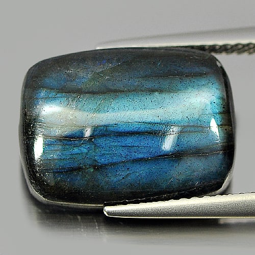 Natural Multi Color Blue Labradorite Doublet 8.99 Ct. Baguette Cabochon Shape 15.9 x 11 Mm. Gemstone: Product ID: 804301203 Product Name: Natural Labradorite Weight: 8.99 CT. Size: 15.9 x 11.7 x 4.9 MM. Shape: Baguette Cabochon Color: Multi-Color Clarity:Opaque Luster: Iridescent Gems Origin: Canada T