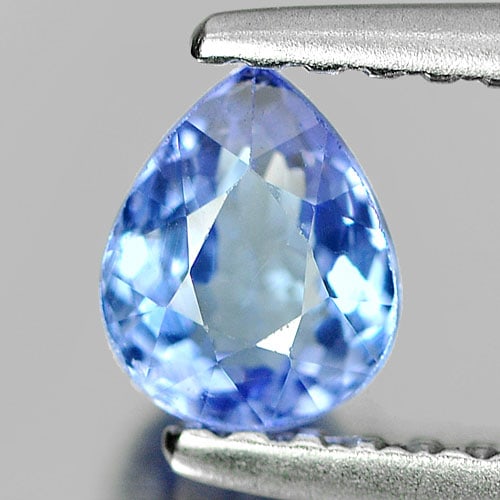 Natural Violetish Blue Tanzanite 0.54 Ct. Pear Shape 5.4 x 4.4 Mm. Gemstone From Tanzania: Product ID: 807007717 Product Name: Natural Tanzanite Weight: 0.54 CT. Size: 5.4 x 4.4 x 3.2 MM. Shape: Pear Color: Violetish Blue Clarity:VSI Luster: Good Gems Origin: Tanzania Treatment: Heated Crys