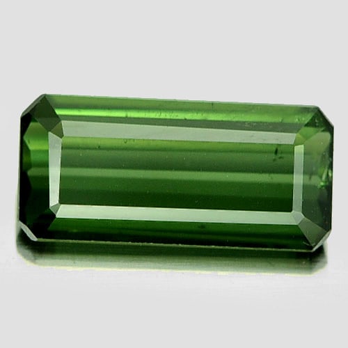 Natural Green Tourmaline 1.08 Ct. Octagon Shape 9.7 x 4.6 Mm. Gemstone Unheated From Nigeria: Product ID: 807246630 Product Name: Natural Tourmaline Weight: 1.08 CT. Size: 9.7 x 4.6 x 2.4 MM. Shape: Octagon Color: Green Clarity:VSI Luster: Good Gems Origin: Nigeria Treatment: Unheated Crystal 