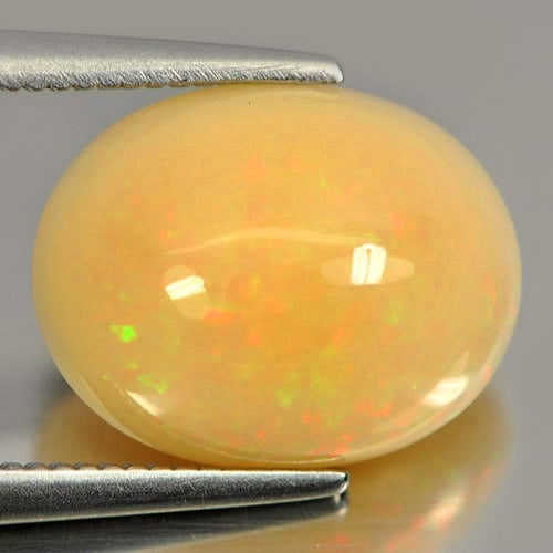 Natural Multi Color Opal 3.35 Ct. Oval Shape 12 x 9.6 Mm Gemstone From Ethiopia: Product ID: 818708398 Product Name: Natural Opal Weight: 3.35 CT. Size: 12 x 9.6 x 6.2 MM. Shape: Oval Cabochon Color: Multi Color Clarity:Opaque Luster: Iridescent Gems Origin: Ethiopia Treatment: Un