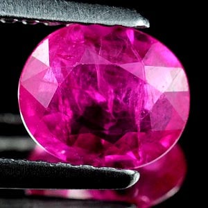 Natural Unheated Purplish Pink Ruby 0.90 Ct. Oval Shape 6.8 x 5.8 Mm. Gemstone From Tanzania (1 of 3)