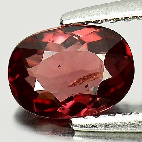Natural Purplish Red Rhodolite Garnet 1.08 Ct. Oval Shape 7.3 x 5.3 Mm Gemstone From Madagascar: Product ID: 802924967 Product Name: Natural Rhodolite Weight: 1.08 CT. Size: 7.3 x 5.3 x 3.1 MM. Shape: Oval Color: Purplish Red Clarity:VSI Luster: Good Gems Origin: Mardagascar Treatment: Unheated C