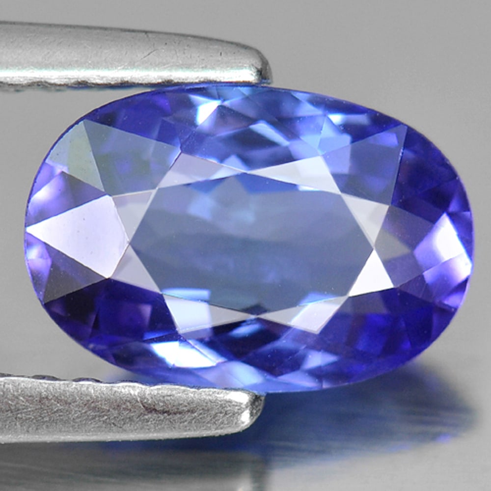 Natural Violetish Blue Tanzanite 1.51 Ct. VVS Oval Shape 8.2 x 5.4 Mm. Gemstone From Tanzania: Product ID: 807006593 Product Name: Natural Tanzanite Weight: 1.51 CT. Size: 8.2 x 5.4 x 2.9 MM. Shape: Oval Color: Violetish Blue Clarity:VVS Luster: Good Gems Origin: Tanzania Treatment: Heated Crys