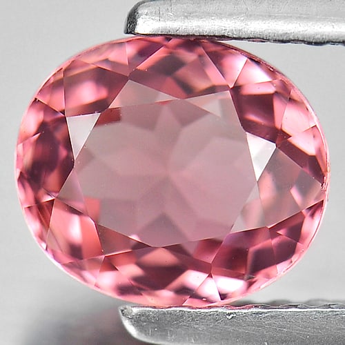 Natural Orangish Pink Tourmaline 1.20 Ct. Oval Shape 7.1 x 6.2 Mm. Gemstone From Nigeria: Product ID: 807238254 Product Name: Natural Tourmaline Weight: 1.20 CT. Size: 7.1 x 6.2 x 3.9 MM. Shape: Oval Color: Orangish Pink Clarity:SI Luster: Good Gems Origin: Nigeria Treatment: Unheated Crys