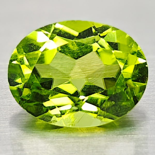 Natural Green Peridot 2.33 Ct. Oval Shape 7 x 9.1 Mm. Gemstone From Pakistan: Product ID: 805316943 Product Name: Natural Peridot Weight: 2.33 CT. Size: 7 x 9.1 x 5 MM. Shape: Oval Color: Green Clarity:VSI Luster: Good Gems Origin: Pakistan Treatment: Unheated Crystal Structure