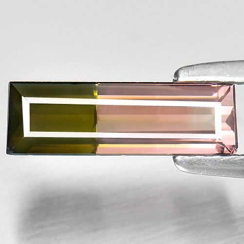 Natural Bi Color Tourmaline 1.38 Ct. Baguette Shape 11.6 x 3.7 Mm. Gemstone From Nigeria: Product ID: 807238679 Product Name: Natural Tourmaline Weight: 1.38 CT. Size: 11.6 x 3.7 x 3.3 MM. Shape: Baguette Color: Bi Color Clarity:VSI Luster: Good Gems Origin: Nigeria Treatment: Unheated Cry