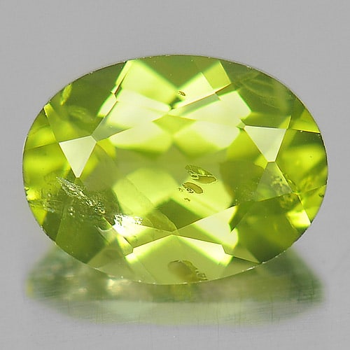 Natural Green Peridot 1.41 Ct. Oval Shape 8 x 6 Mm. Unheated Gemstone From Pakistan: Product ID: 805314292 Product Name: Natural Peridot Weight: 1.41 CT. Size: 8 x 6 x 4 MM. Shape: Oval Color: Green Clarity:SI1 Luster: Good Gems Origin: Pakistan Treatment: Unheated Crystal Structure: 