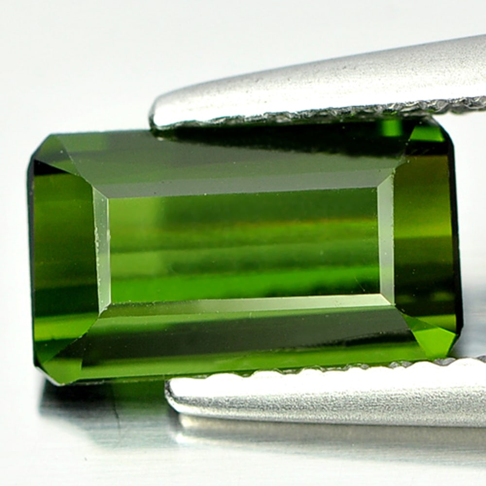 Natural Green Tourmaline 1.14 Ct. VVS Octagon Shape 8.3 x 4.9 Mm. Gemstone From Nigeria: Product ID: 807249497 Product Name: Natural Tourmaline Weight: 1.14 CT. Size: 8.3 x 4.9 x 3.2 MM. Shape: Octagon Color: Green Clarity:VVS Luster: Good Gems Origin: Nigeria Treatment: Unheated Crystal 