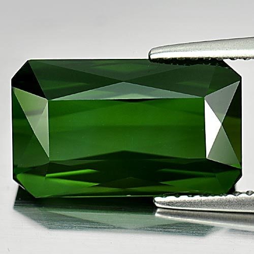 Natural Green Tourmaline 7.51 Ct. Clean Octagon Shape 14.8 x 8.9 Mm. Gemstone From Nigeria: Product ID: 807221091 Product Name: Natural Tourmaline Weight: 7.51 CT. Size: 14.8 x 8.9 x 6.2 MM. Shape: Octagon Color: Green Clarity:IF Luster: Good Gems Origin: Nigeria Treatment: Unheated Crystal 