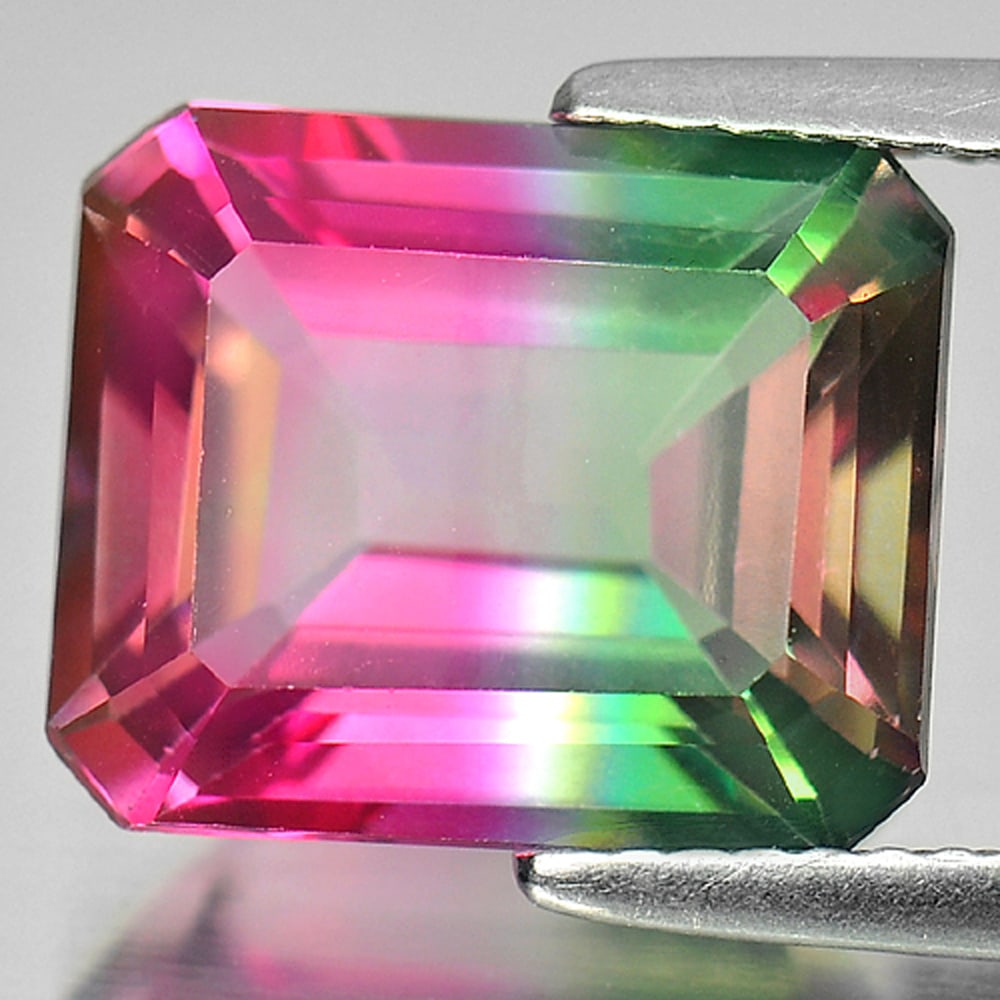 Natural Emerald Envy Pure Pink Topaz 7.19 Ct. VVS Octagon Shape 12 x 10 Mm. Gemstone From Brazil: Product ID: 807166458 Product Name: Natural Topaz Weight: 7.19 CT. Size: 12 x 10 x 6.3 MM. Shape: Octagon Color: Bi-Color Clarity:VVS Luster: Good Gems Origin: Brazil Treatment: Treated Crystal Struct