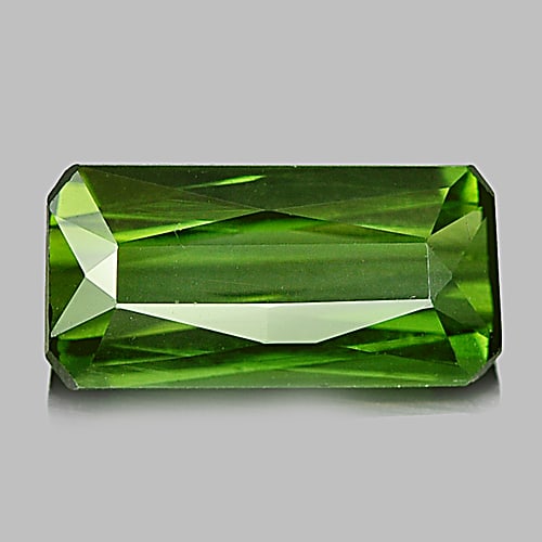 Natural Green Tourmaline 1.83 Ct. Clean Octagon 10.5 x 5.2 Mm. Unheated Gemstone From Nigeria: Product ID: 807225878 Product Name: Natural Tourmaline Weight: 1.83 CT. Size: 10.5 x 5.2 x 3.6 MM. Shape: Octagon Color: Good Clarity:IF Luster: Very Good Gems Origin: Nigeria Treatment: Unheated Crys