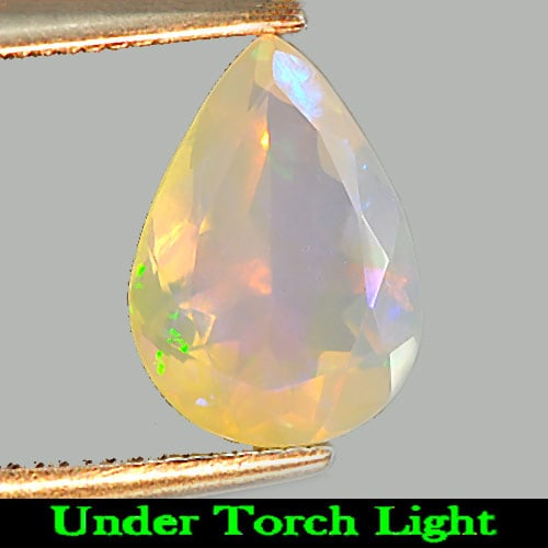 Natural Multi Color Play Of Colour Opal 1.13 Ct. Pear Shape 10 x 7.1 Mm Gemstone From Ethiopia: Product ID: 818725380 Product Name: Natural Opal Weight: 1.13 CT. Size: 10 x 7.1 x 5 MM. Shape: Pear Color: Multi Color Clarity:Semi - Transparent Luster: Iridescent Gems Origin: Ethiopia Treatment: U