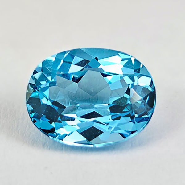 Natural Swiss Blue Topaz 2.28 Ct. Oval Shape 9 x 7 Mm Gemstone from Brazil: Product ID: 807167818 Product Name: Natural Blue Topaz Weight: 2.28 CT. Size: 9 x 7 x 4.7 MM. Shape: Oval Color: Blue Clarity:VSI Luster: Good Gems Origin: Brazil Treatment: Treated Crystal Structure: