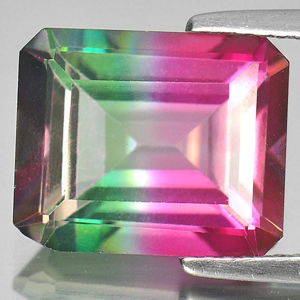 Natural Emerald Envy Pure Pink Topaz 7.44 Ct. VVS Octagon Shape 12 x 10 Mm. Gemstone From Brazil: Product ID: 807166464 Product Name: Natural Topaz Weight: 7.44 CT. Size: 12 x 10 x 6.6 MM. Shape: Octagon Color: Bi-Color Clarity:VVS Luster: Good Gems Origin: Brazil Treatment: Treated Crystal Struct