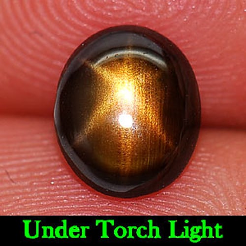 Certified Golden Star Sapphire 6 Ray 1.24 Ct. Oval Cabochon Shape 6.13 x 7.33 Mm. Natural Gemstone: Product ID: 806149978 Product Name: Natural Star Sapphire Weight: 1.24 CT. Size: 6.13 x 7.33 x 2.26 MM. Shape: Oval Cabochon Color: Yellow Clarity:Opaque Luster: Good 6 Ray Star Gems Origin: Thailand 