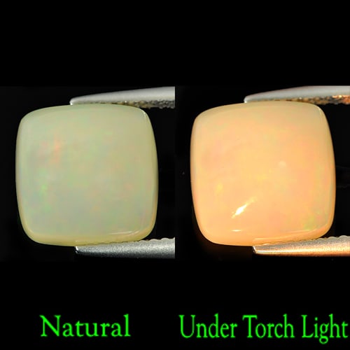 Natural Multi-Color Opal 4.04 Ct. Cushion Cabochon Shape 10.7 Mm Gemstone From Ethiopia: Product ID: 818722565 Product Name: Natural Opal Weight: 4.04 CT. Size: 10.7 x 10.7 x 6.2 MM. Shape: Cushion Cabochon Color: Multi-Color Clarity:Semi - Transparent Luster: Iridescent Gems Origin: Ethi