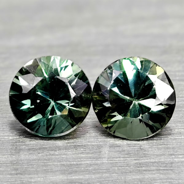 Natural Fancy Color Sapphire 0.37 Ct. 2 Pcs Round Diamand Cut 3.4 Mm Gemstones From Tanzania: Product ID: 806162235 Product Name: Natural Green Sapphire Weight: 0.37 CT. Size: 3.4 x 3.4 x 2.3 MM. Shape: Round Diamond Cut Color: Fancy Color Clarity:VSI Luster: Very Good Gems Origin: Tanzania Tr