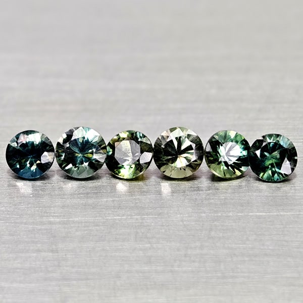 Natural Fancy Color Sapphire 1.19 Ct. 6 Pcs Round Diamand Cut 3.5 Mm Gemstones From Tanzania: Product ID: 806162170 Product Name: Natural Green Sapphire Weight: 1.19 CT. Size: 3.5 x 3.5 x 2.5 MM. Shape: Round Diamond Cut Color: Fancy Color Clarity:VSI Luster: Very Good Gems Origin: Tanzania Tr