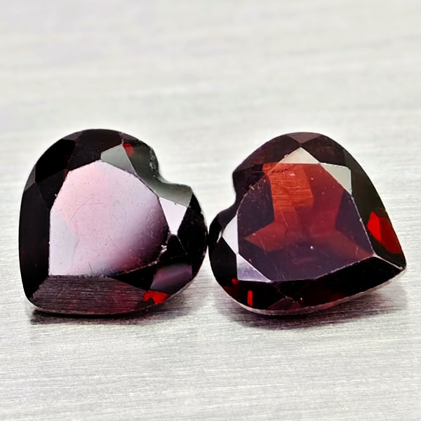 Natural Orangish Red Garnet 2.46 Ct. 2 Pcs Heart Shape 6.9 x 6.9 MM Gemstones From Tanzania: Product ID: 802936622 Product Name: Natural Red Garnet Weight: 2.46 CT. Size: 6.9 x 6.9 x 3.5 MM. Shape: Heart Shape Color: Orangish Red Clarity:VSI Luster: Good Gems Origin: Tanzania Treatment: Unhea