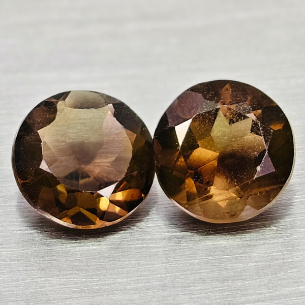 Natural Smokey Color Quartz 1.51 Ct. 2 Pcs Round Shape 6.2 Mm Gemstones From Brazil: Product ID: 805529916 Product Name: Natural Quartz Weight: 1.51 CT. Size: 6.2 x 6.2 x 4 MM. Shape: Round Color: Smokey Clarity:VSI Luster: Good Gems Origin: Brazil Treatment: Unheated Crystal Structur