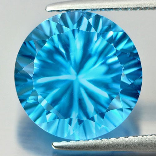 Natural Swiss Blue Topaz 7.82 Ct. Clean Round Cornflower Cut Shape 12.1 Mm. Gemstone From Brazil: Product ID: 807165841 Product Name: Natural Blue Topaz Weight: 7.82 CT. Size: 12.1 x 12.1 x 7.6 MM. Shape: Round Cornflower Cut Color: Blue Clarity:IF Luster: Very Good Gems Origin: Brazil Treatment: 